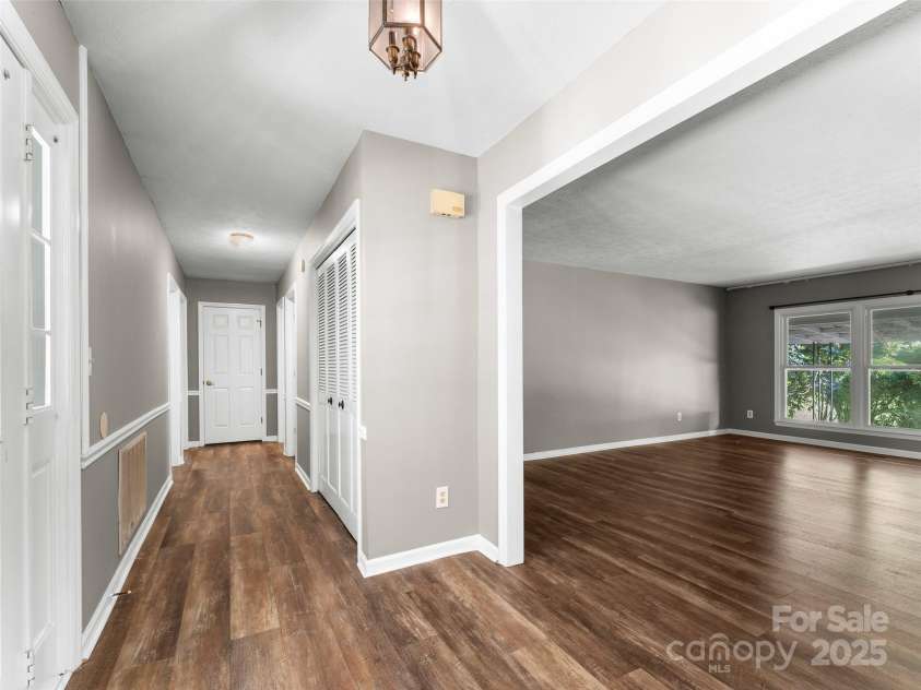 165 Crestview Drive, Hendersonville, NC 28791.  MLS# CAR4279718, YatesRealty ID 27239. Foyer, looking into Living Room