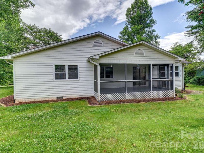 31 St Andrews Drive, Etowah, NC 28729.  MLS# CAR4379830, YatesRealty ID 27240. Back of Home