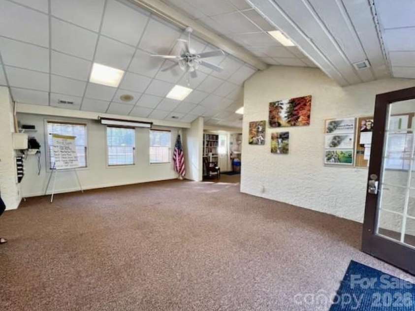 31 St Andrews Drive, Etowah, NC 28729.  MLS# CAR4379830, YatesRealty ID 27240. Community Center Gathering Area