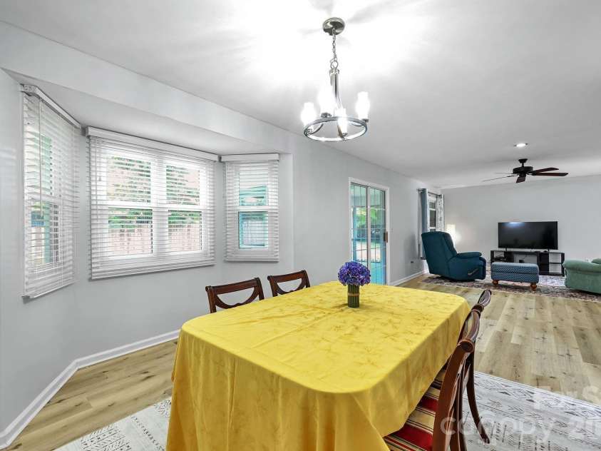31 St Andrews Drive, Etowah, NC 28729.  MLS# CAR4379830, YatesRealty ID 27240. Dining area to Living Room 