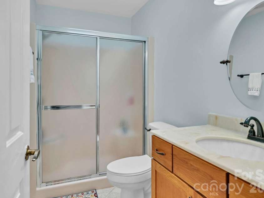 31 St Andrews Drive, Etowah, NC 28729.  MLS# CAR4379830, YatesRealty ID 27240. Guest Bathroom 