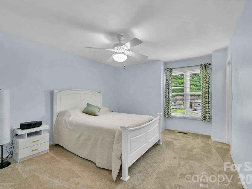 31 St Andrews Drive, Etowah, NC 28729.  MLS# CAR4379830, YatesRealty ID 27240. Guest Bedroom 1 with Ceiling Fan,  Walk-In Closet 
