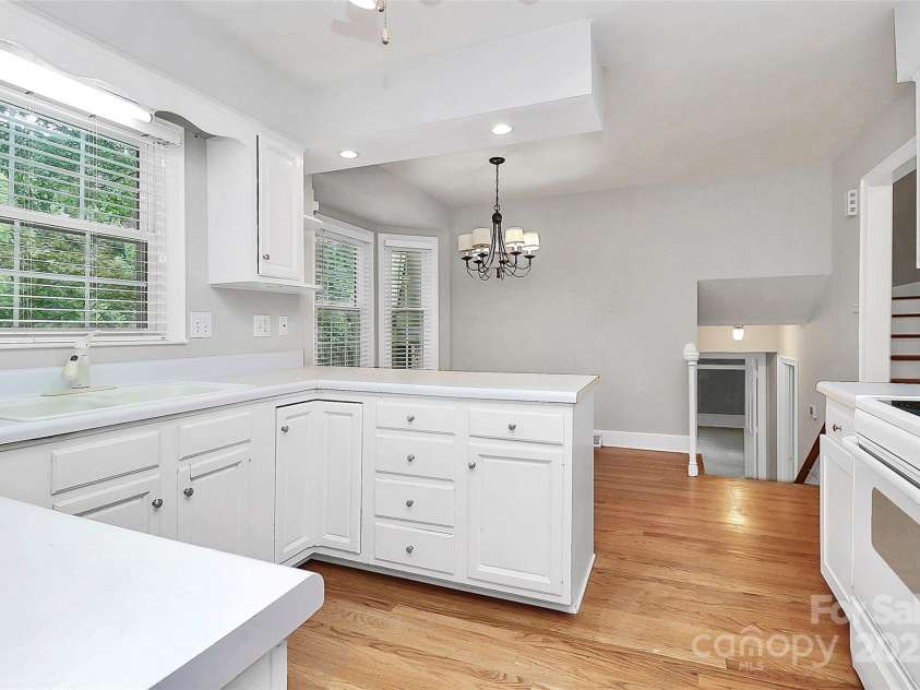 4210 Pepperidge Drive, Charlotte, NC 28226.  MLS# CAR4218122, YatesRealty ID 27240. Kitchen with white cabinetry