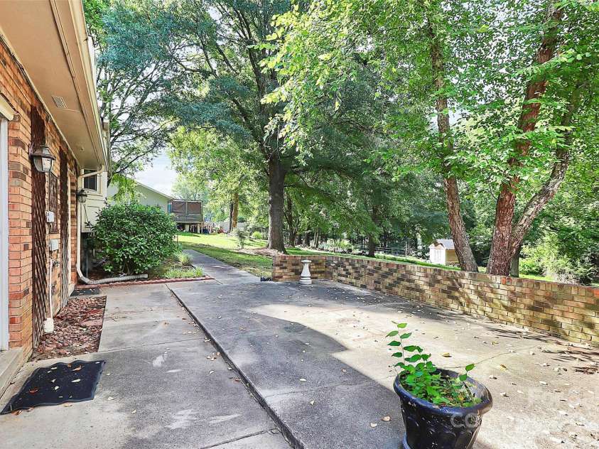 4210 Pepperidge Drive, Charlotte, NC 28226.  MLS# CAR4218122, YatesRealty ID 27240. Rear patio