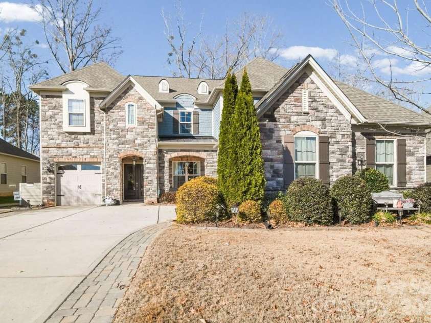 1006 Wellington Avenue, Indian Land, SC 29707.  MLS# CAR4334105, YatesRealty ID 27242. Beautifully Landscaped with mature trees and a welcoming entry way- 1006 Wellington Avenue is ready to be called home!