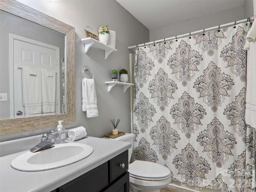554 Pisgah Forest Drive, Pisgah Forest, NC 28768.  MLS# CAR4375652, YatesRealty ID 27244. Basement full bath