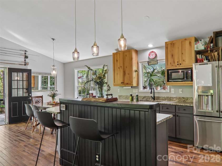 554 Pisgah Forest Drive, Pisgah Forest, NC 28768.  MLS# CAR4375652, YatesRealty ID 27244. Kitchen breakfast bar