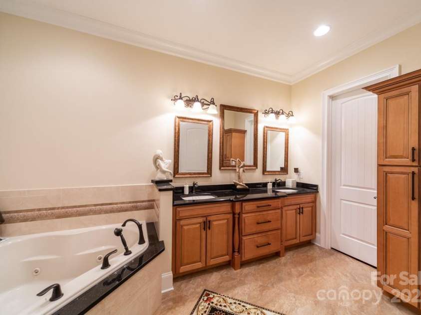 108 Washam Road, Mooresville, NC 28117.  MLS# CAR4281847, YatesRealty ID 27246. Primary Bathroom