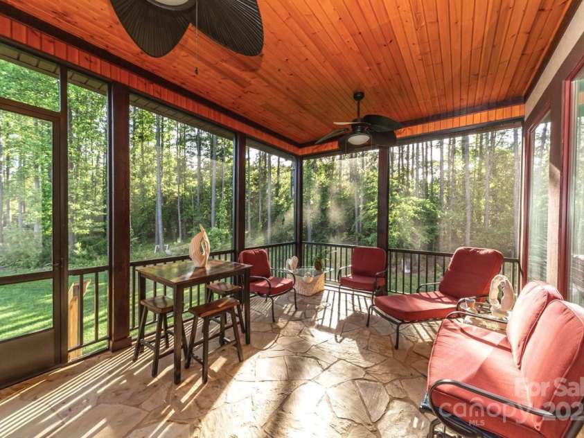108 Washam Road, Mooresville, NC 28117.  MLS# CAR4281847, YatesRealty ID 27246. Screened back porch
