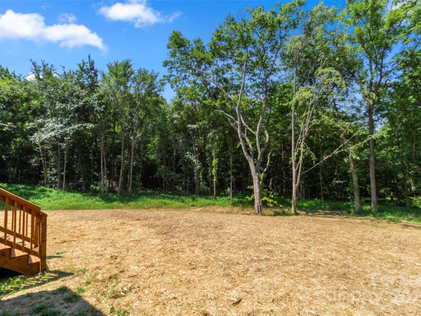 299 Collingswood Drive, Concord, NC 28027.  MLS# CAR4278657, YatesRealty ID 27247. Back Yard