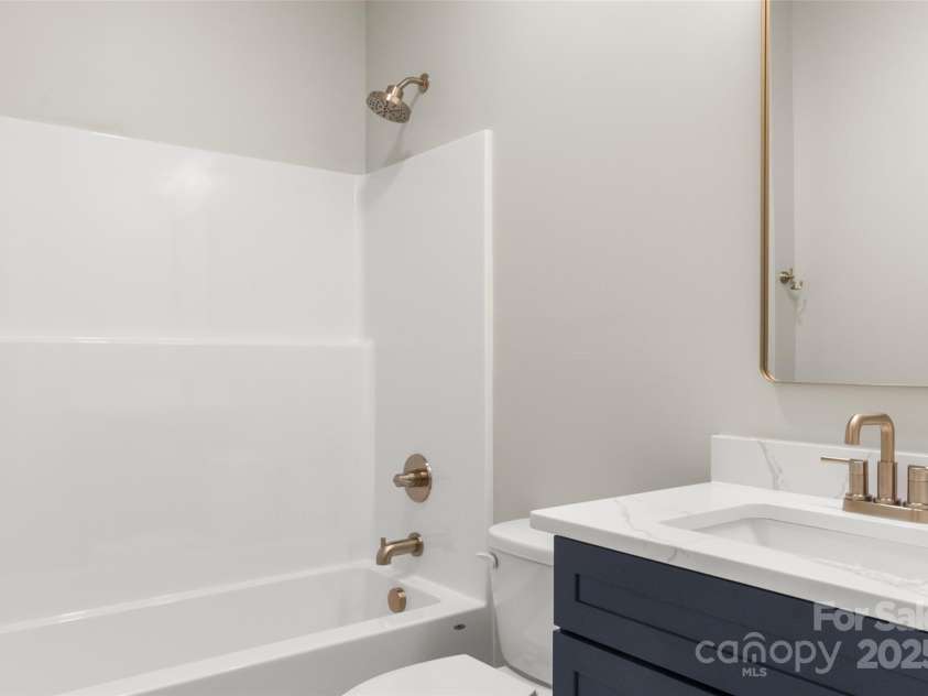 299 Collingswood Drive, Concord, NC 28027.  MLS# CAR4278657, YatesRealty ID 27247. Hall Bathroom