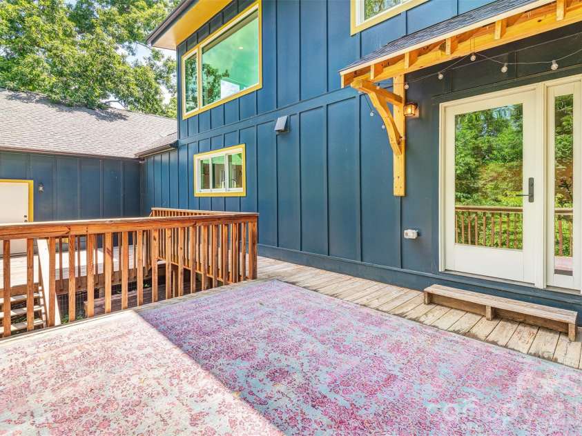 136 Graveyard Road, Fairview, NC 28730.  MLS# CAR4387672, YatesRealty ID 27249. Back deck