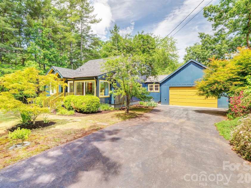 136 Graveyard Road, Fairview, NC 28730.  MLS# CAR4387672, YatesRealty ID 27249. Fully Updated Farmhouse on over 2 acres