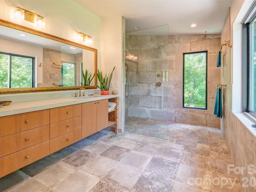136 Graveyard Road, Fairview, NC 28730.  MLS# CAR4387672, YatesRealty ID 27249. Stunning Primary Bathroom