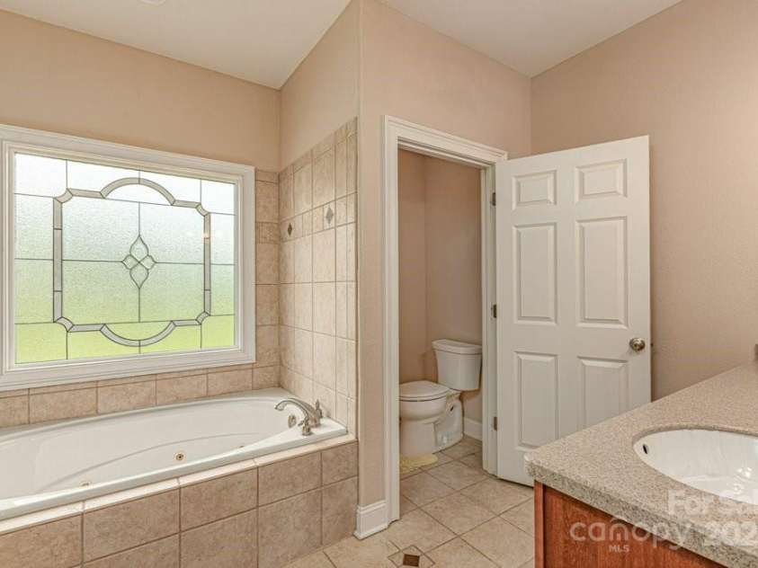 4004 3rd Court, Morganton, NC 28655.  MLS# CAR4269854, YatesRealty ID 27255. Additional view of primary suite bathroom