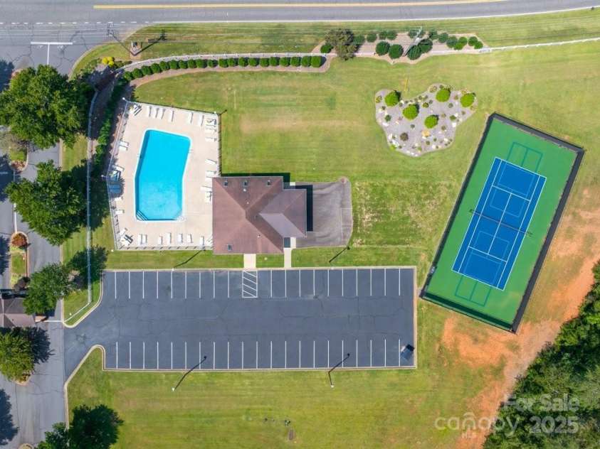 4004 3rd Court, Morganton, NC 28655.  MLS# CAR4269854, YatesRealty ID 27255. Enjoy resort-style living with these beautifully maintained HOA amenities, designed for relaxation and recreation. The spacious community pool area offers plenty of lounge seating for soaking up the sun, while the adjacent 