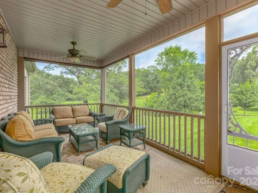 4004 3rd Court, Morganton, NC 28655.  MLS# CAR4269854, YatesRealty ID 27255. Rear covered screened in back porch conveniently located directly off the living room