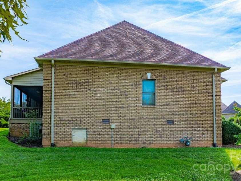 4004 3rd Court, Morganton, NC 28655.  MLS# CAR4269854, YatesRealty ID 27255. Side view w/ screened in back porch