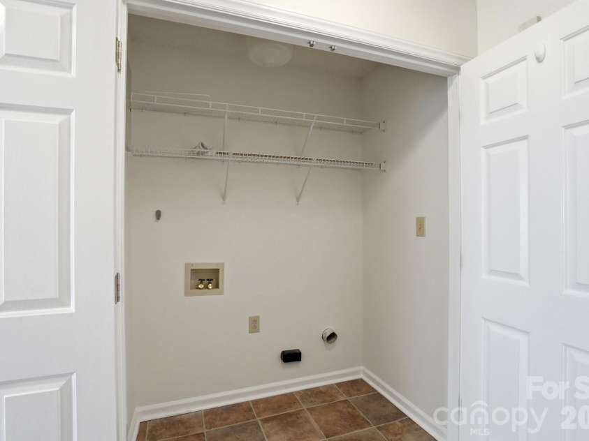 5908 Heathrow Court, Monroe, NC 28110.  MLS# CAR4346315, YatesRealty ID 27257. Laundry closet