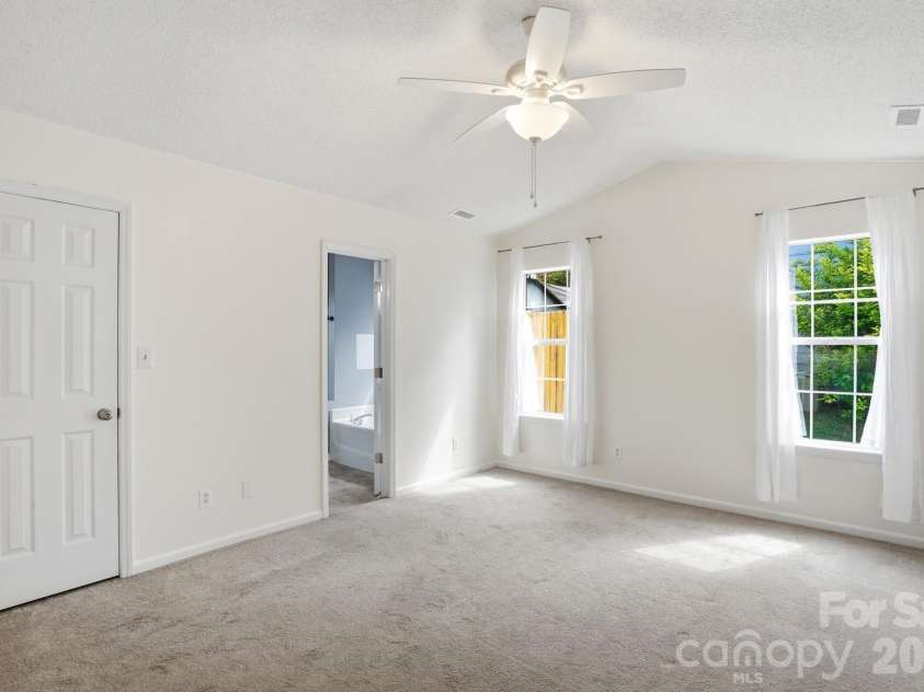 5908 Heathrow Court, Monroe, NC 28110.  MLS# CAR4346315, YatesRealty ID 27257. Primary Bedroom