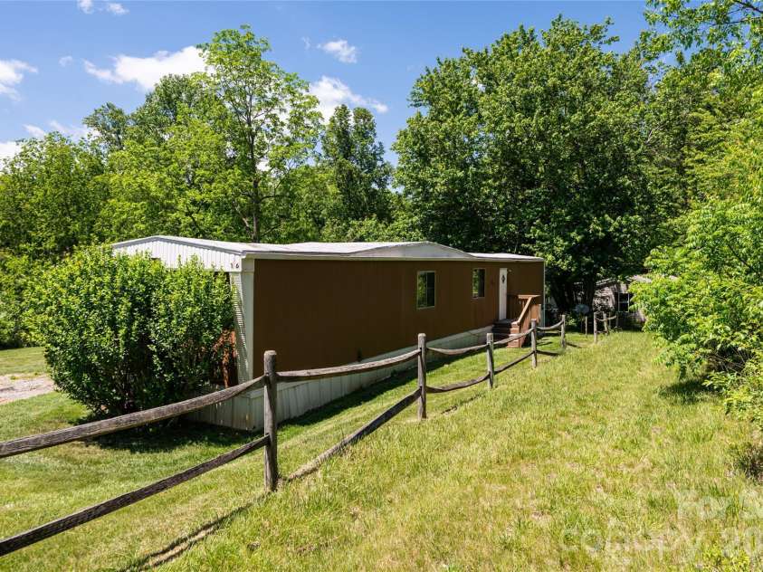 106 Aloha Circle Extension, Candler, NC 28715.  MLS# CAR4385168, YatesRealty ID 27258. Additional Lot Available. Will not be sold separately. 110 Aloha Cir Ext-available for purchase with 106 Aloha Cir Ext- PID 869714221600000,