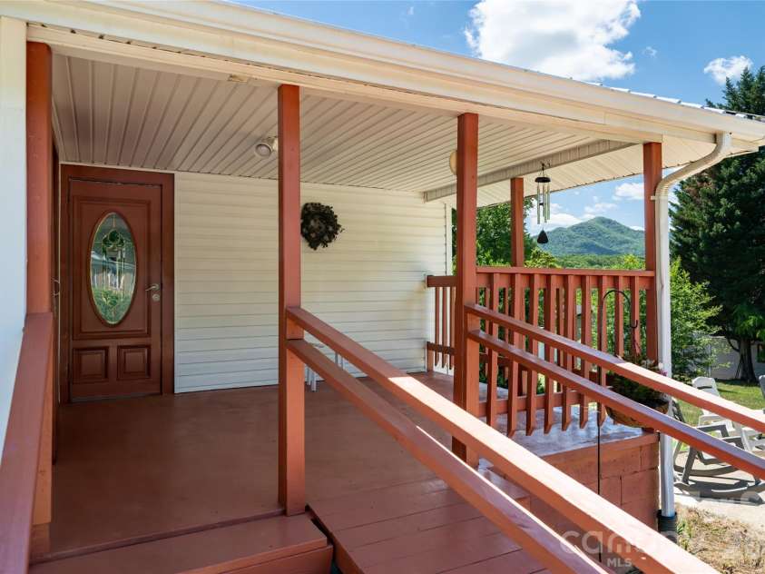 106 Aloha Circle Extension, Candler, NC 28715.  MLS# CAR4385168, YatesRealty ID 27258. Freshly painted front porch
