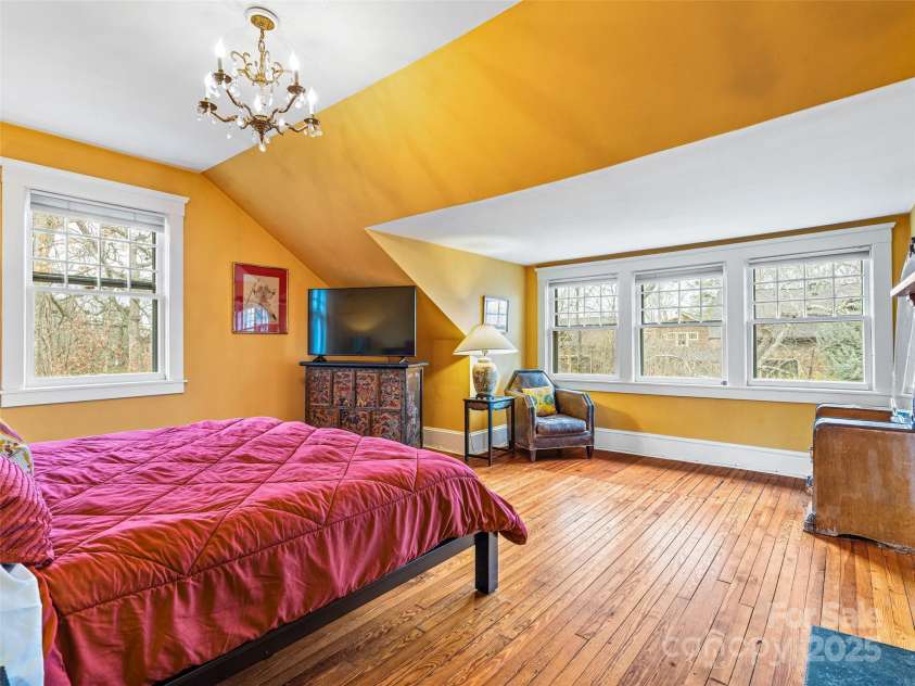 12 Bearden Avenue, Asheville, NC 28801.  MLS# CAR4331679, YatesRealty ID 2726. 3rd bedroom upstairs, extra large and flooded with natural light. Mountain views!