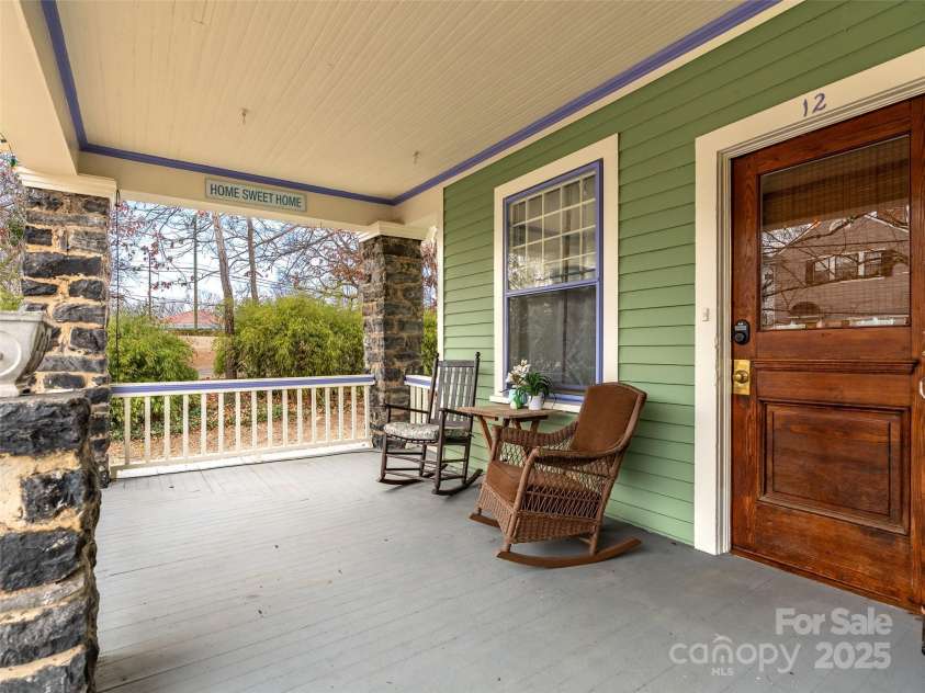 12 Bearden Avenue, Asheville, NC 28801.  MLS# CAR4331679, YatesRealty ID 2726. Deep front porch with original wood front door. 