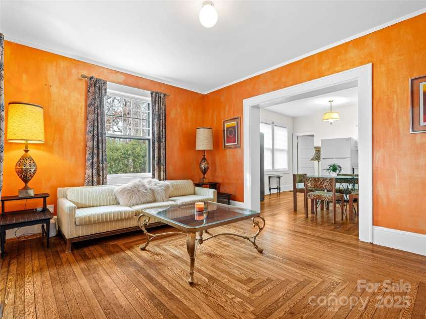 12 Bearden Avenue, Asheville, NC 28801.  MLS# CAR4331679, YatesRealty ID 2726. Large main level living area. Currently used for unit #1.