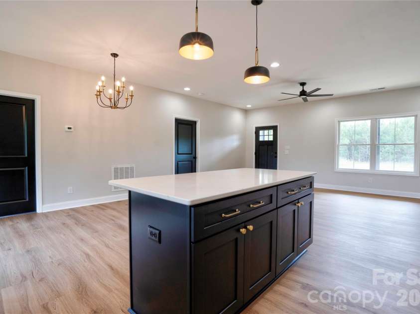 1168 Granite Drive, Shelby, NC 28152.  MLS# CAR4383048, YatesRealty ID 27264. Living Room, Dining Roo & Kitchen