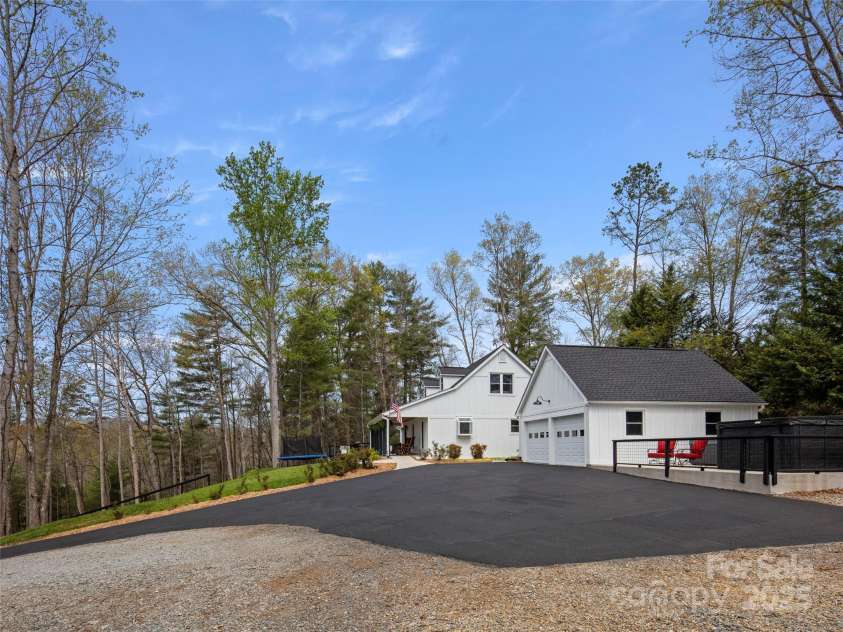 30 Gap Hill Drive, Fletcher, NC 28732.  MLS# CAR4249216, YatesRealty ID 27265. Additional parking area and gravel recently added for all your toys! RVs, boats, multiple vehicles, ATVs, etc
