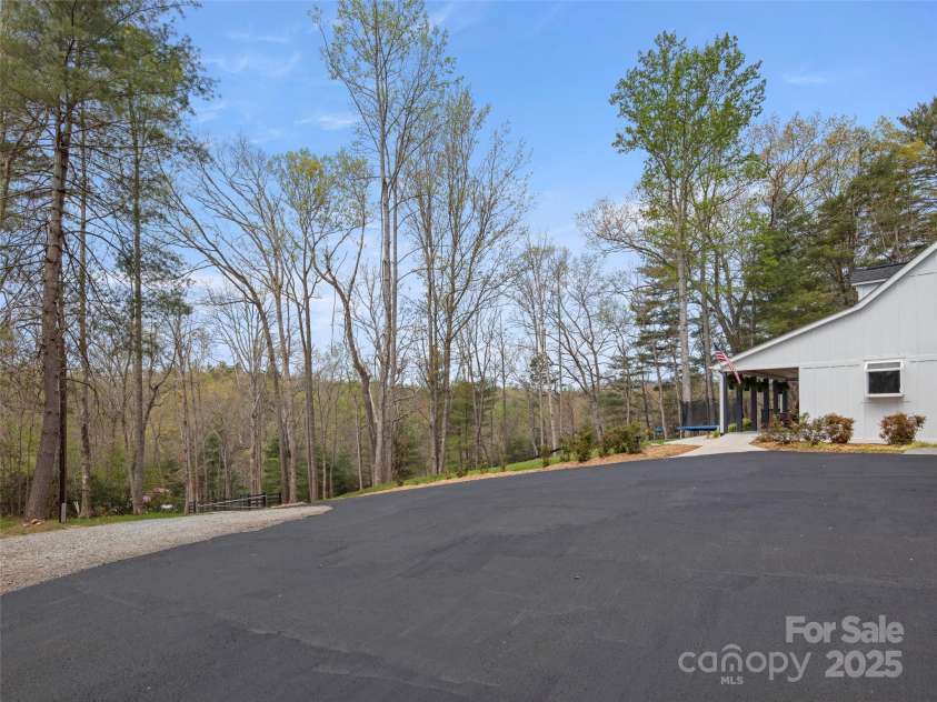 30 Gap Hill Drive, Fletcher, NC 28732.  MLS# CAR4249216, YatesRealty ID 27265. Driveway was just resealed
