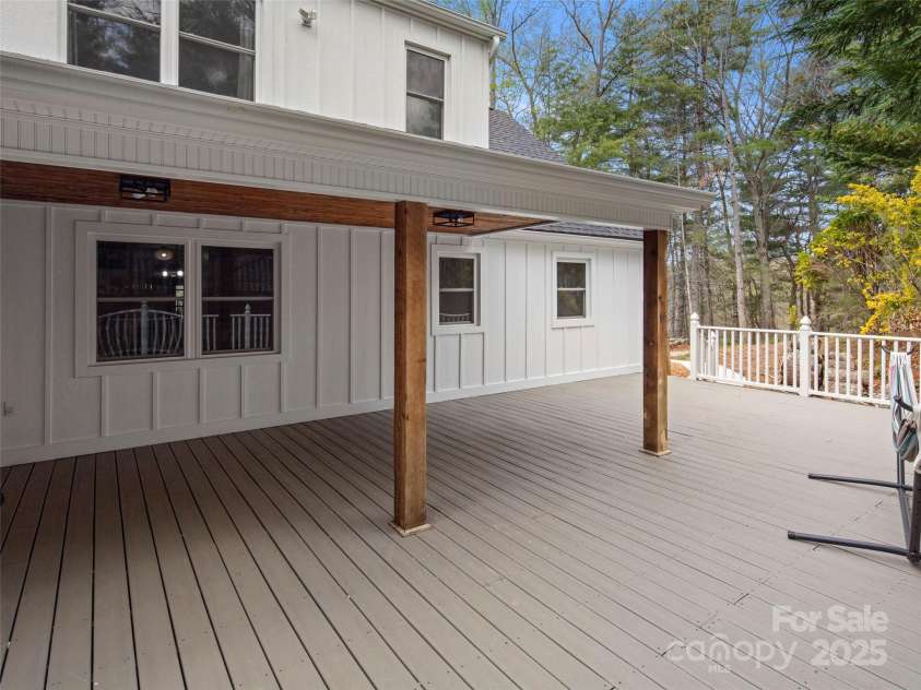 30 Gap Hill Drive, Fletcher, NC 28732.  MLS# CAR4249216, YatesRealty ID 27265. Expansive porches on both the front and back of the house