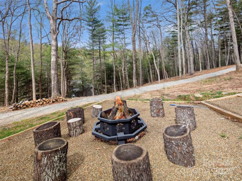 30 Gap Hill Drive, Fletcher, NC 28732.  MLS# CAR4249216, YatesRealty ID 27265. Firewood already cut for you