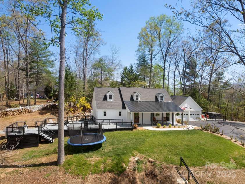 30 Gap Hill Drive, Fletcher, NC 28732.  MLS# CAR4249216, YatesRealty ID 27265. Grass seed has been applied to the front yard