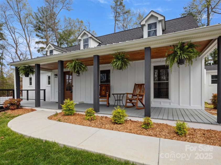 30 Gap Hill Drive, Fletcher, NC 28732.  MLS# CAR4249216, YatesRealty ID 27265. The perfect front porch for enjoying nature