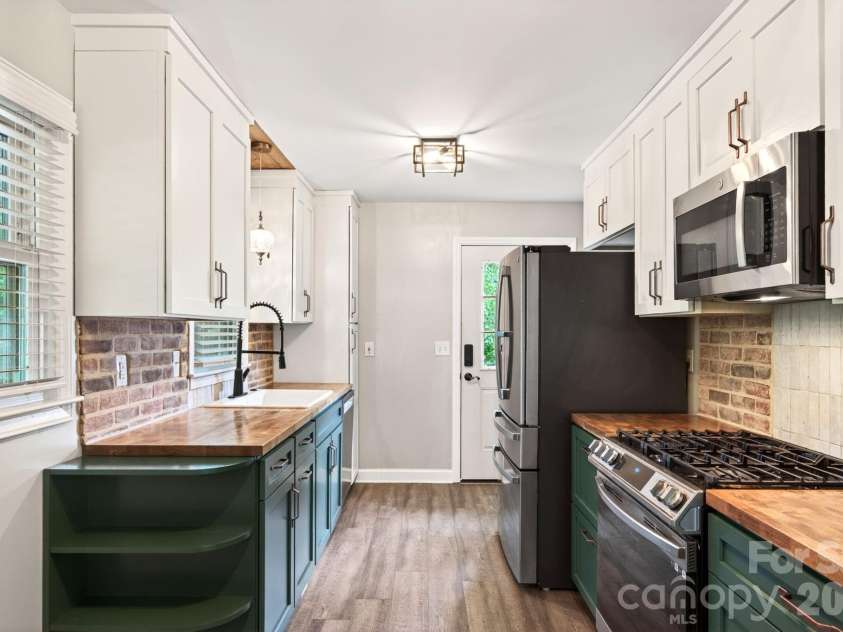 65 Farley Street, Waynesville, NC 28786.  MLS# CAR4386250, YatesRealty ID 27268. Updated kitchen 