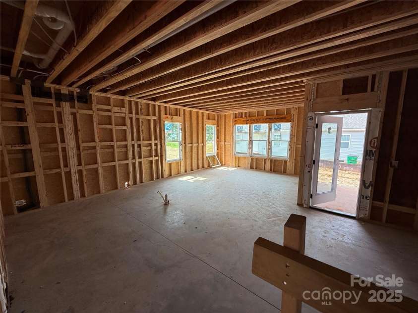 2735 Primrose Avenue, Charlotte, NC 28208.  MLS# CAR4267281, YatesRealty ID 27269. Kitchen and Living