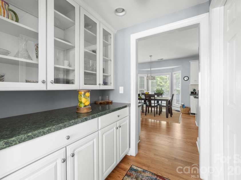 8812 Kingston Forest Drive, Charlotte, NC 28277.  MLS# CAR4374456, YatesRealty ID 27269. Butler's pantry connecting dining room & kitchen. 