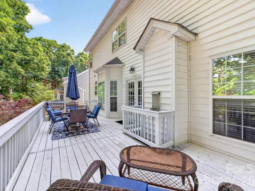 8812 Kingston Forest Drive, Charlotte, NC 28277.  MLS# CAR4374456, YatesRealty ID 27269. Extended deck