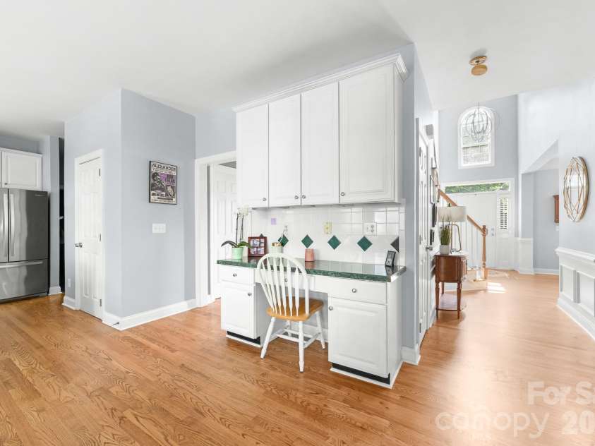 8812 Kingston Forest Drive, Charlotte, NC 28277.  MLS# CAR4374456, YatesRealty ID 27269. Large built in desk with overhead storage