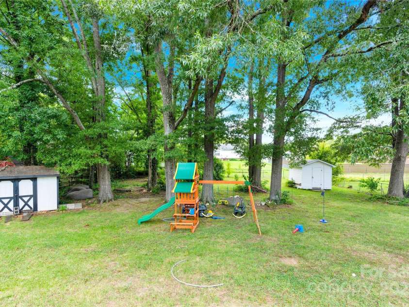 501 Kingfield Drive, Concord, NC 28027.  MLS# CAR4275301, YatesRealty ID 27271. 2 Sheds