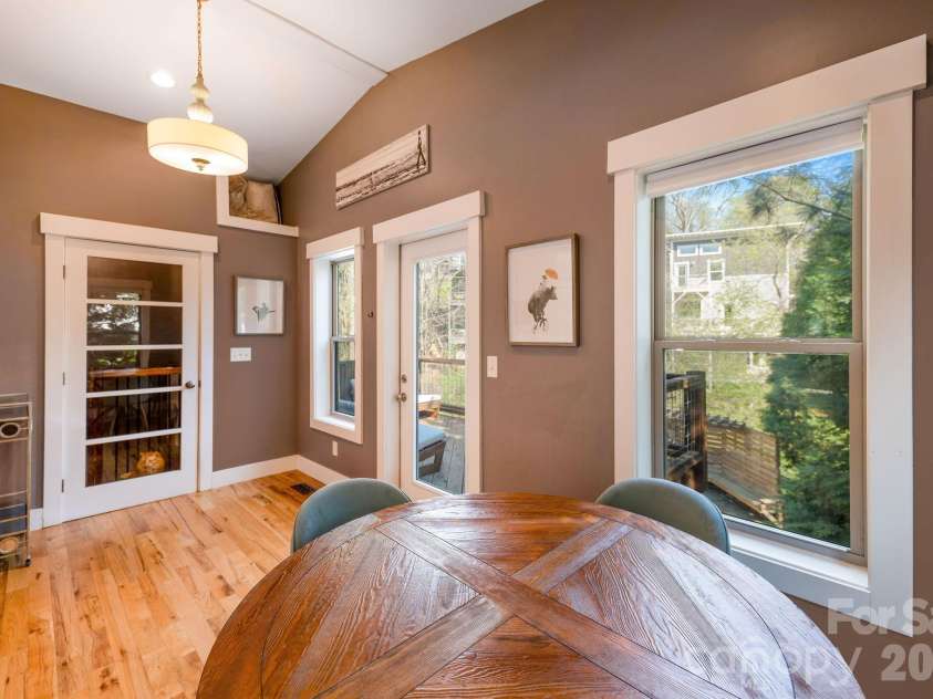 156 Bradley Street, Asheville, NC 28806.  MLS# CAR4364055, YatesRealty ID 27274. Dining area to back porch