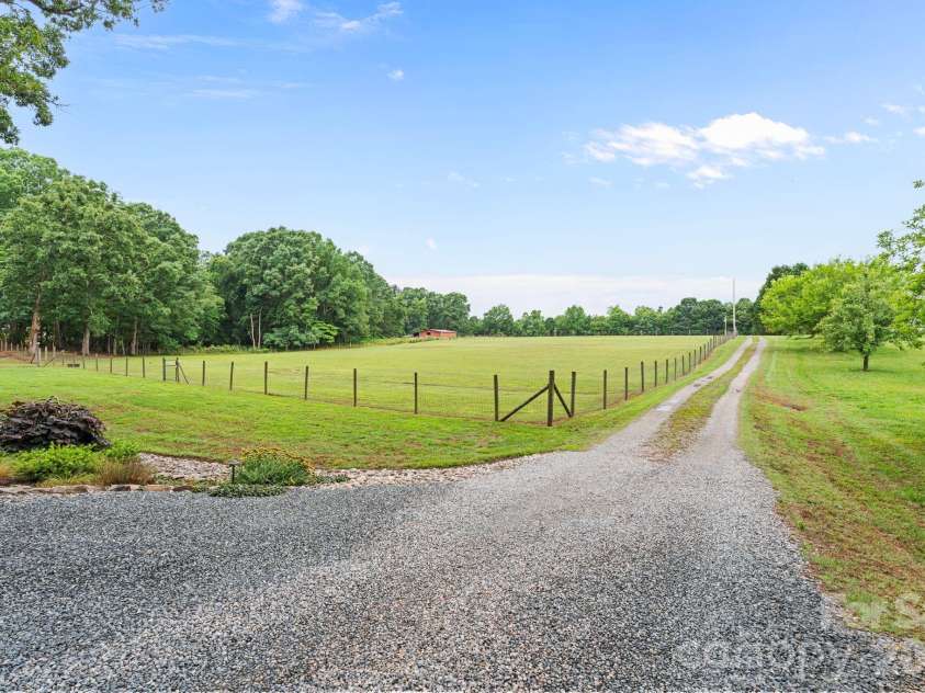 1744 Lowe Drive, Catawba, NC 28609.  MLS# CAR4384724, YatesRealty ID 27281. Driveway Looking at Pastures