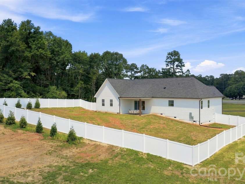 390 NC HWY 200 None, Stanfield, NC 28163.  MLS# CAR4383746, YatesRealty ID 27282. Backyard w/ privacy fence