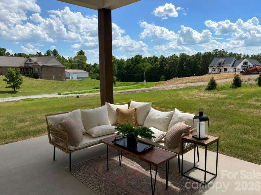 390 NC HWY 200 None, Stanfield, NC 28163.  MLS# CAR4383746, YatesRealty ID 27282. Covered back patio w/ solid oak post & ceiling fan