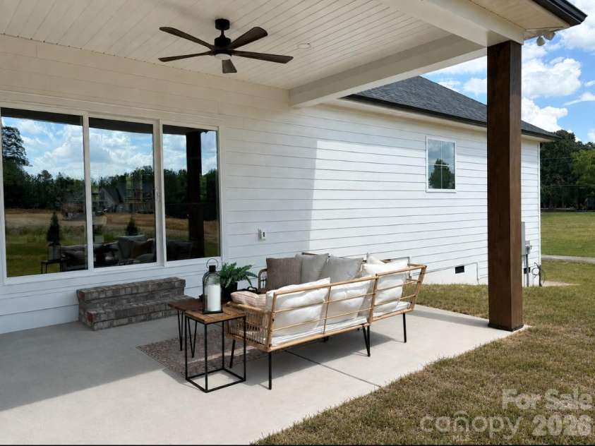 390 NC HWY 200 None, Stanfield, NC 28163.  MLS# CAR4383746, YatesRealty ID 27282. Covered back patio w/ solid oak post & ceiling fan