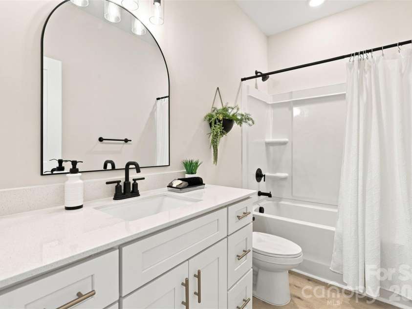 390 NC HWY 200 None, Stanfield, NC 28163.  MLS# CAR4383746, YatesRealty ID 27282. Full bath shared between bedroom 3 & 4
