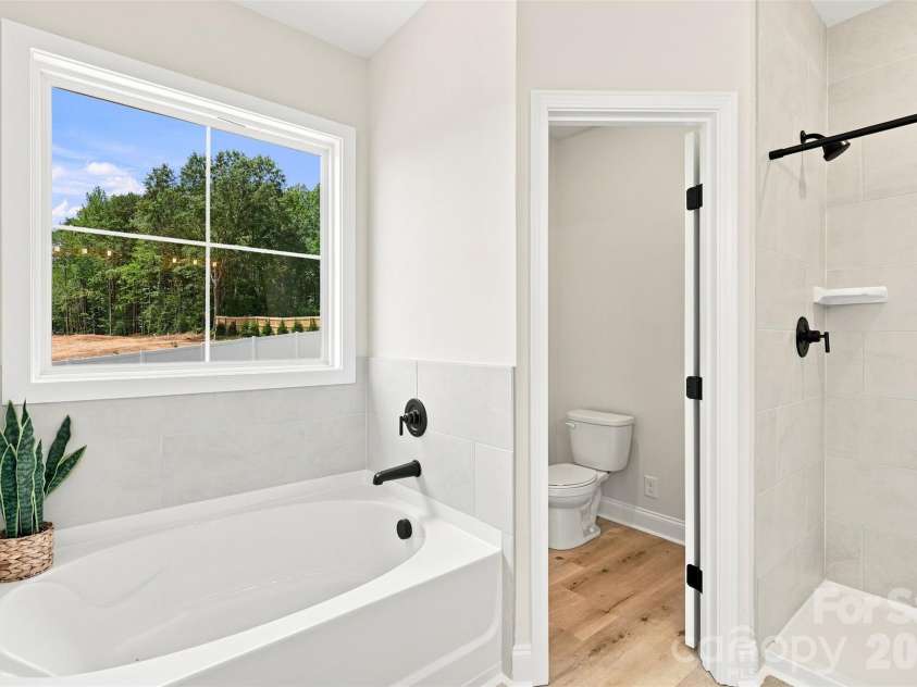 390 NC HWY 200 None, Stanfield, NC 28163.  MLS# CAR4383746, YatesRealty ID 27282. Primary ensuite full bath