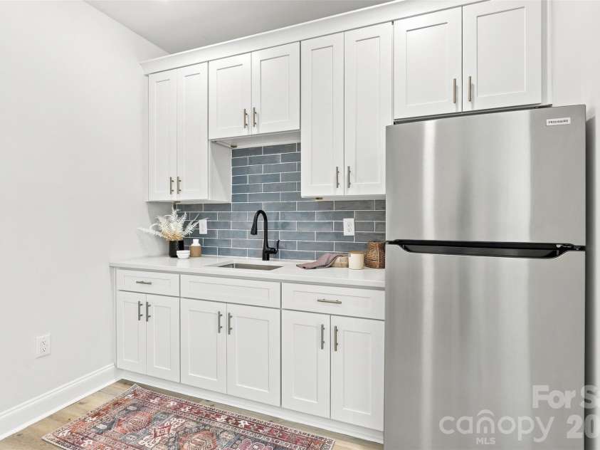 390 NC HWY 200 None, Stanfield, NC 28163.  MLS# CAR4383746, YatesRealty ID 27282. Secondary living quarters kitchenette